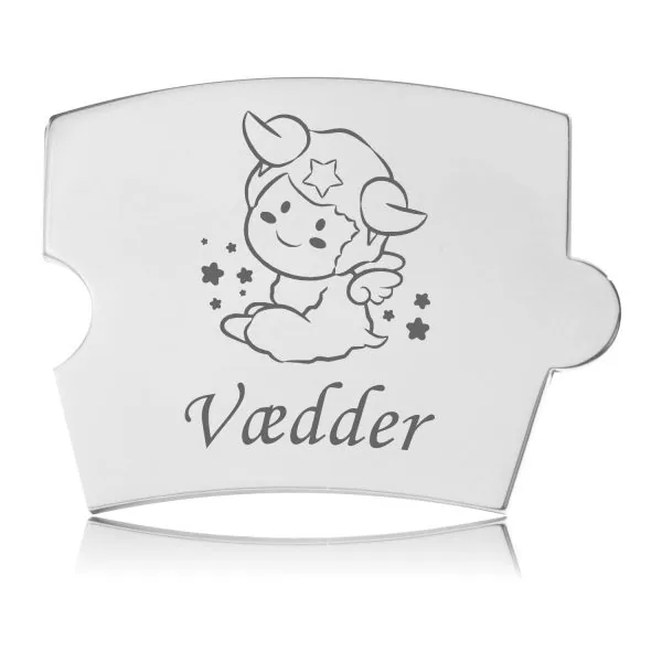 Memozz Spin brik med motiver af en sød, tegnet Vædder-figur i rustfrit stål, omgivet af stjerner og teksten "Vædder" indgraveret.