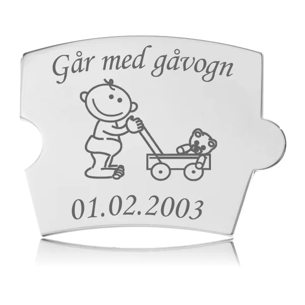 Memozz Spin brik "Går med gåvogn" i håndpoleret rustfrit stål med lasergraveret illustration af baby og gåvogn