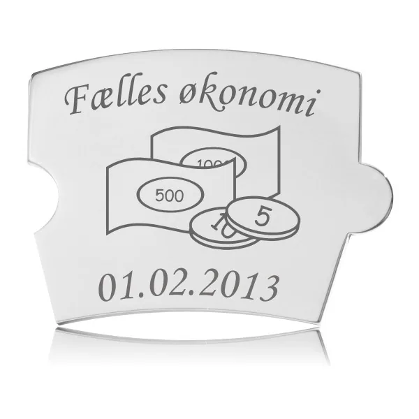 Memozz Spin brik i håndpoleret rustfrit stål med gravering "Fælles økonomi" og illustration af pengesedler og mønter