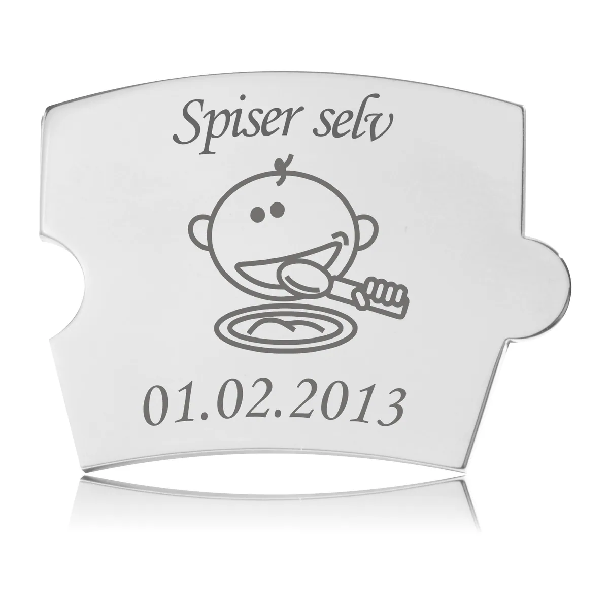 Memozz Spin brik i poleret rustfrit stål med teksten "Spiser selv" og en illustration af en baby der spiser fra en tallerken.